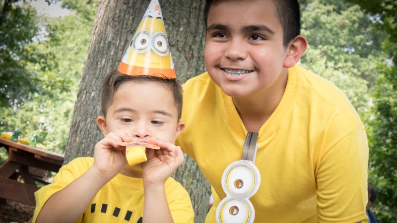 Two kids wearing Minion tshirts