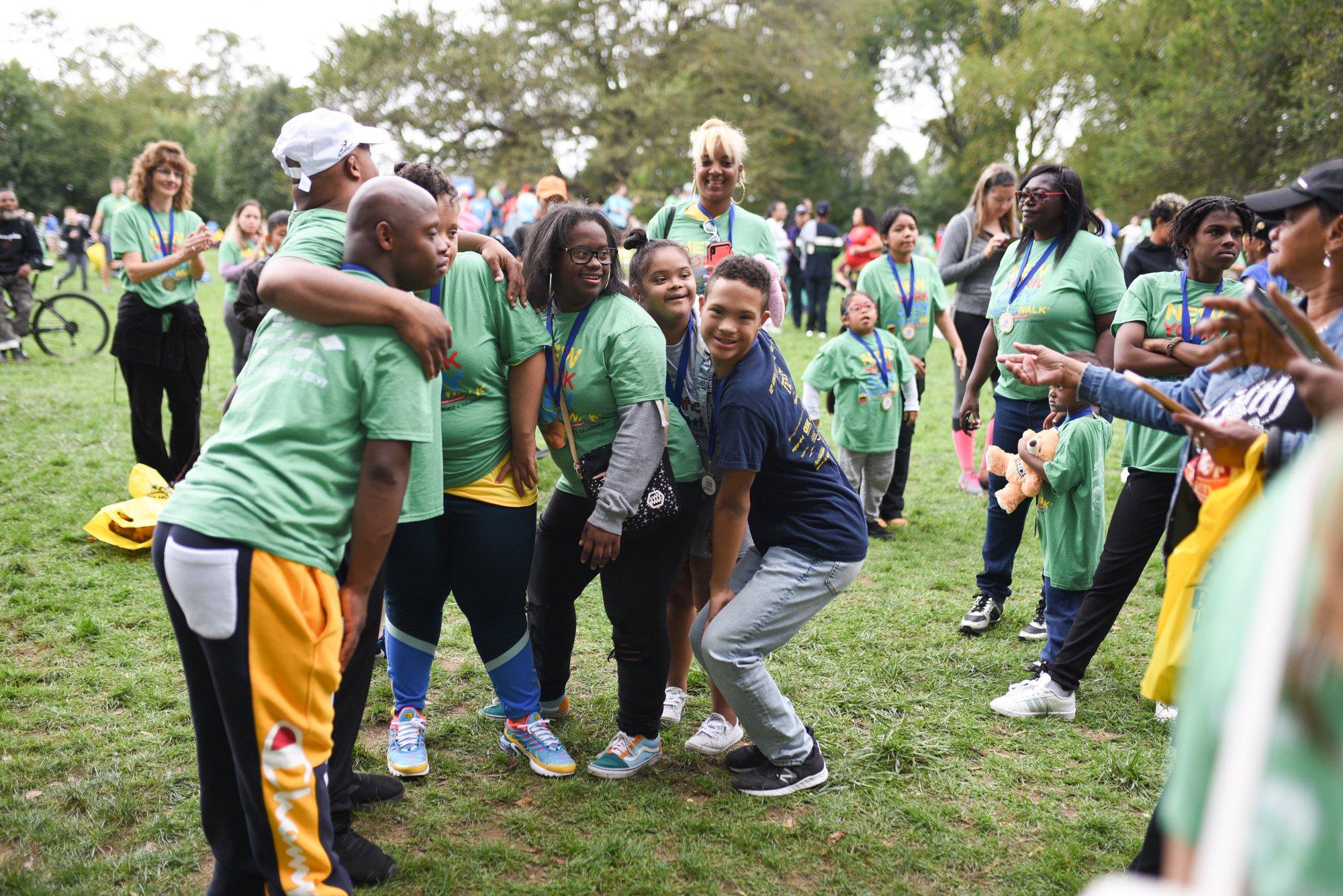 Family taking a photo at NYC Buddy Walk