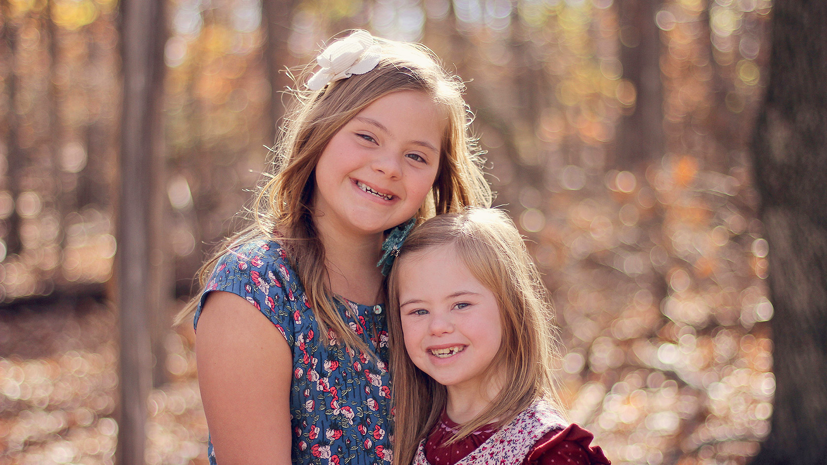 Two smiling sisters