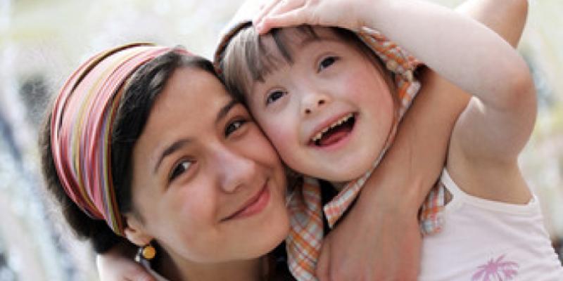 Smiling woman and child