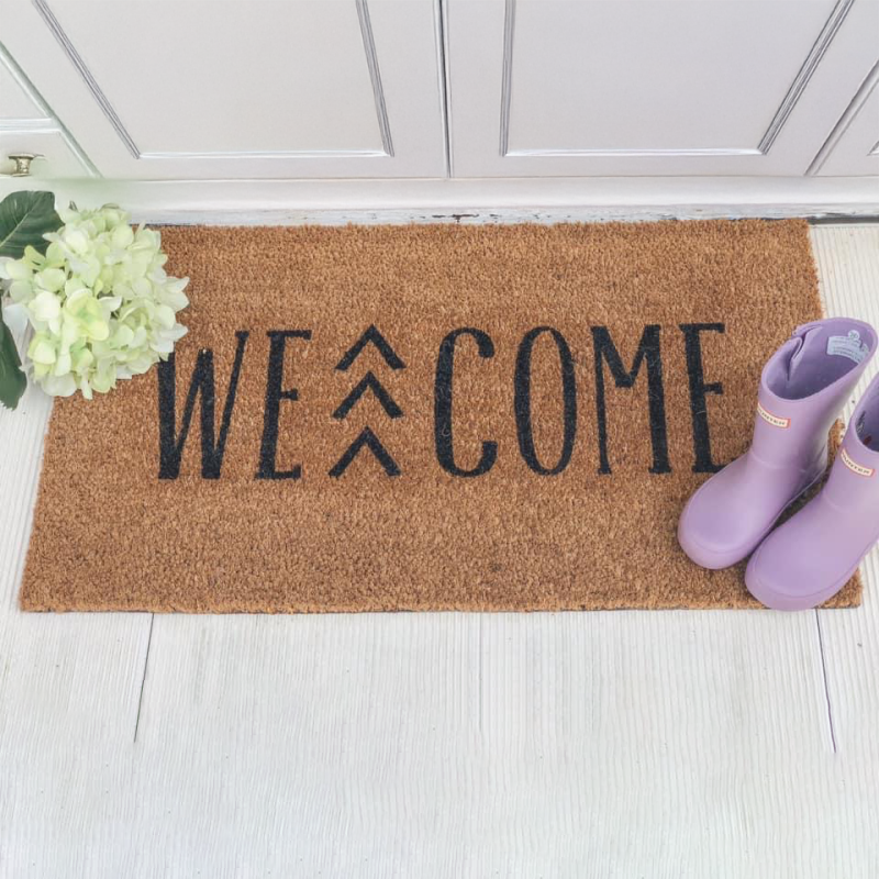 large_welcome_down_syndrome_doormat